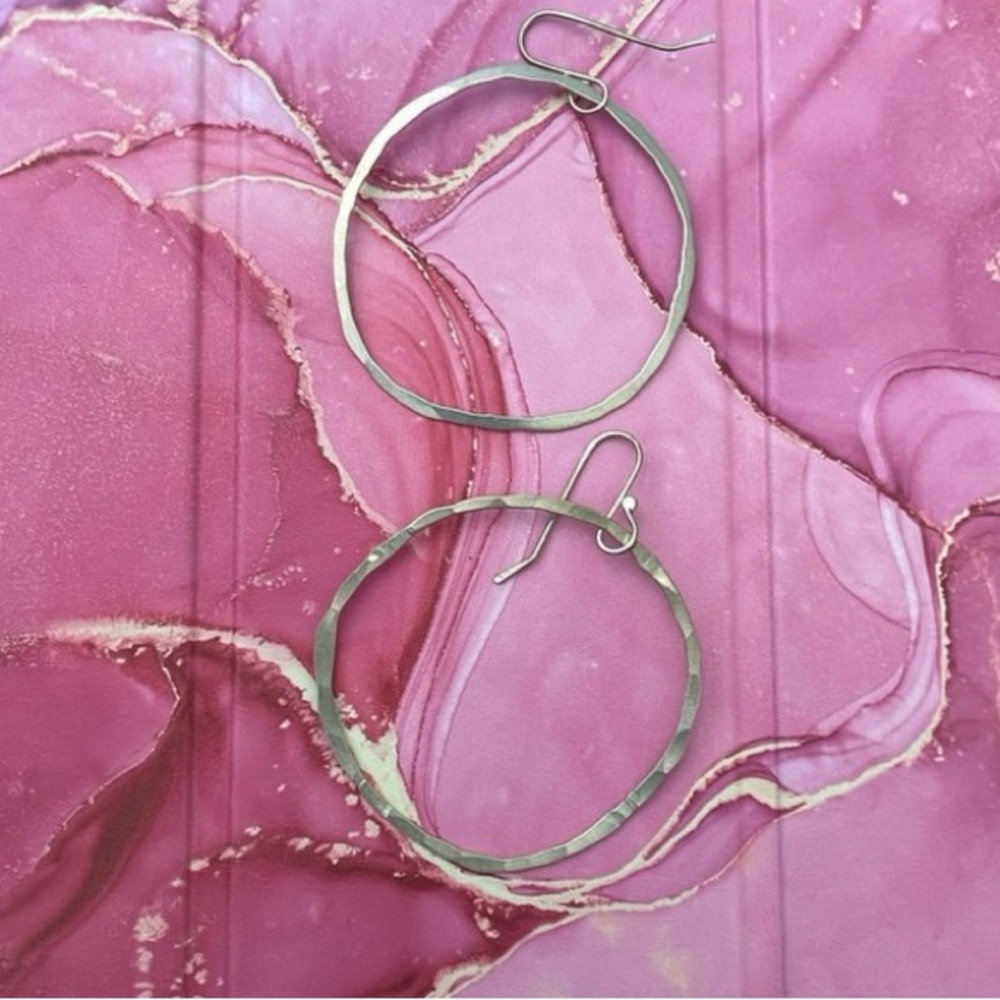 Round hoop silver tone earrings